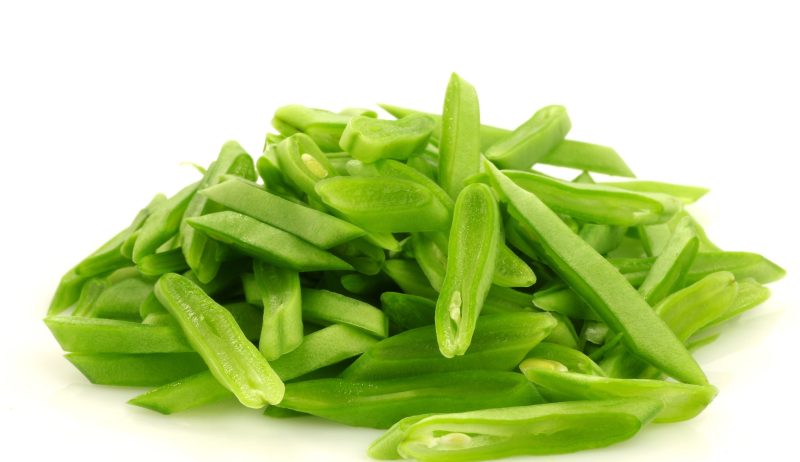Heap,Of,Cut,String,Beans,On,A,White,Background